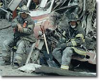 911 Firemen rest during the rescue